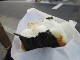 Grilled rice ball with miso. Picked this goodness up from a street vendor in Nagano.
